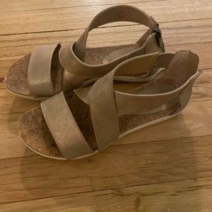 Strap gold sandals.  Size 7.5, cork footbed.